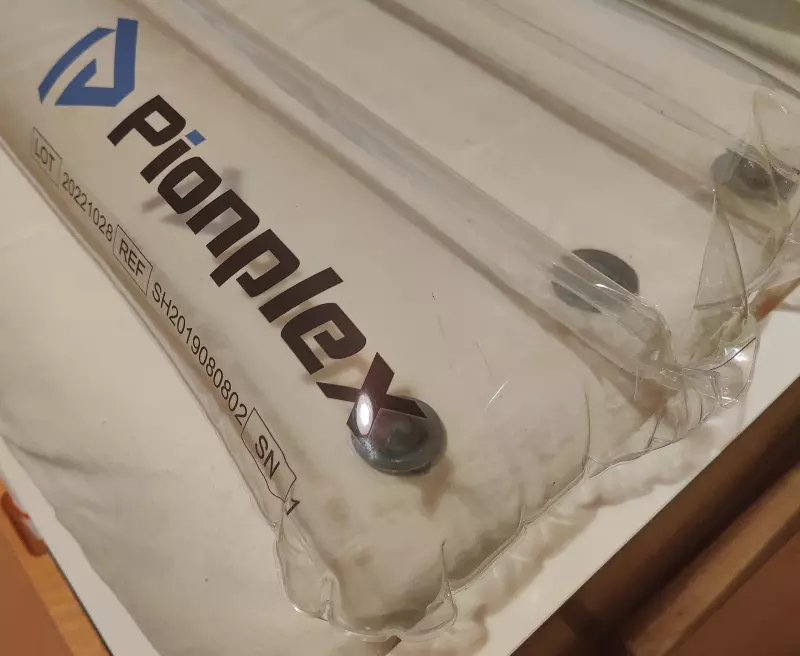 transparent air bed with Pionplex logo